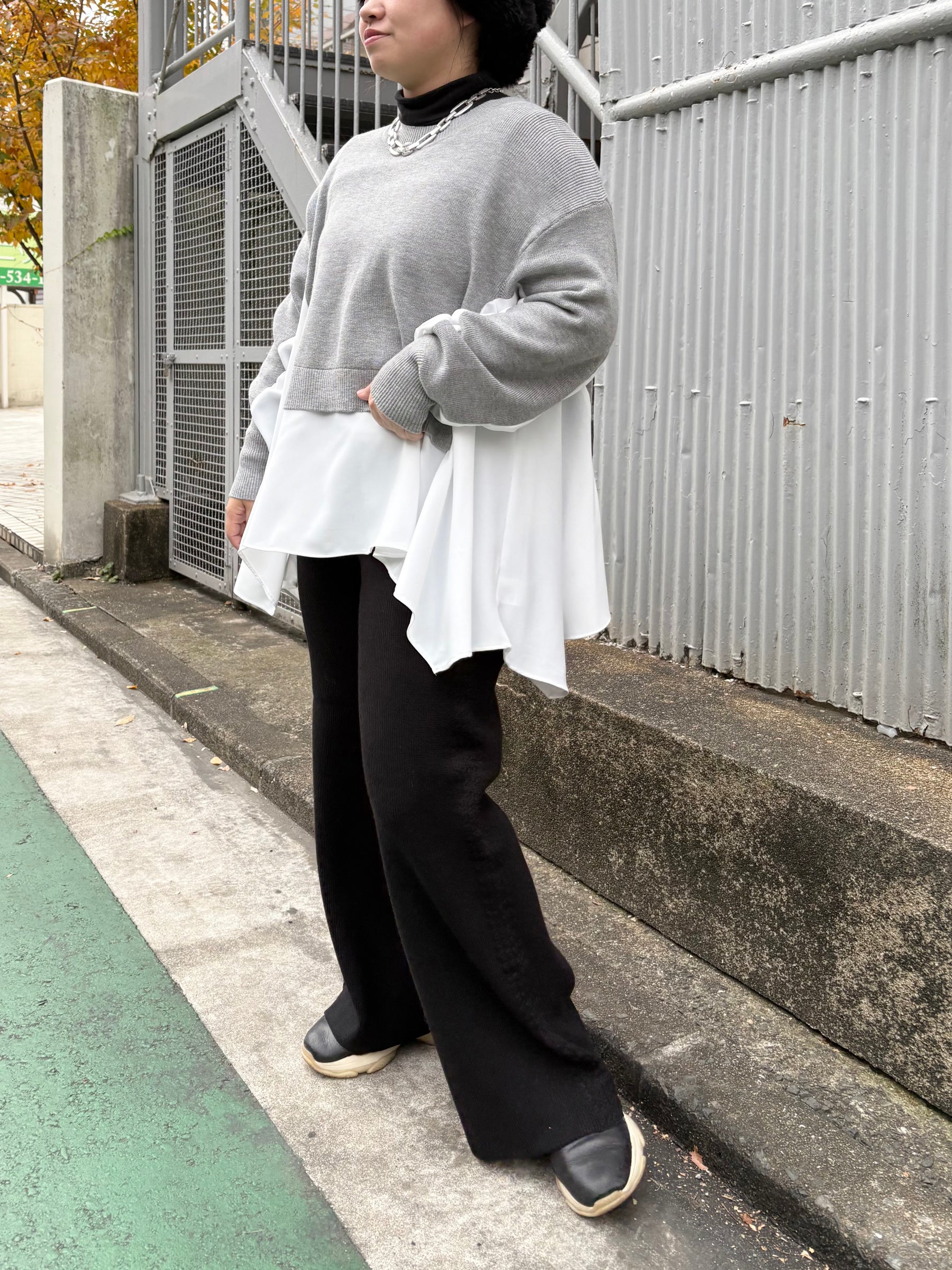 裾フレア異素材ドッキングニット