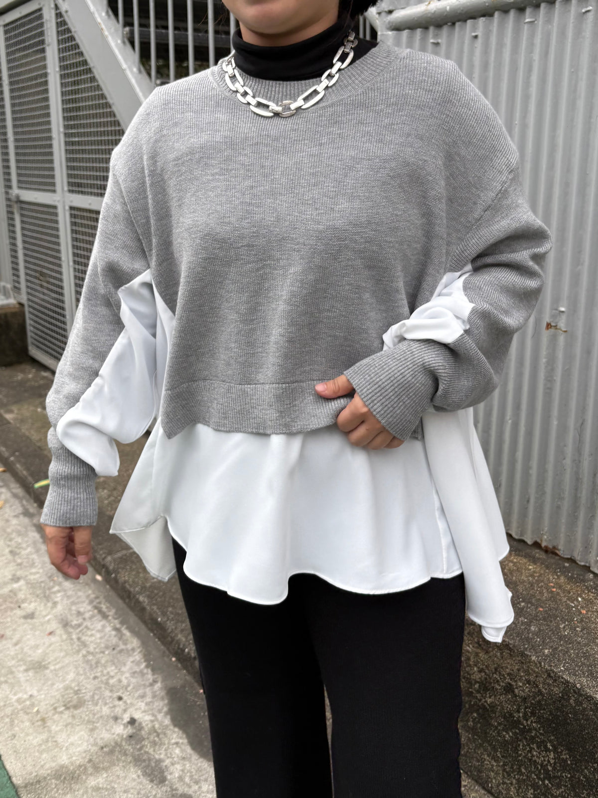 裾フレア異素材ドッキングニット