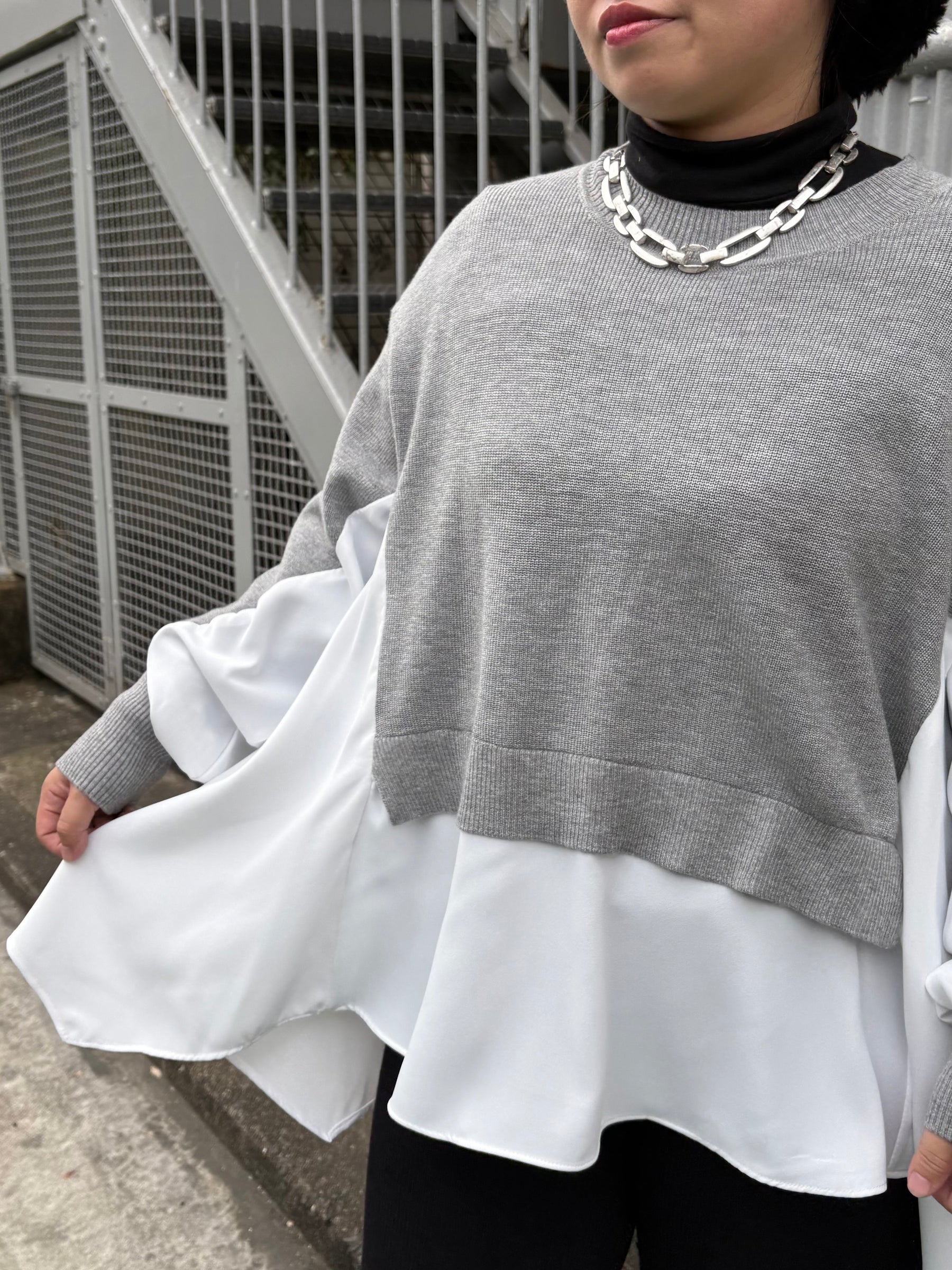 裾フレア異素材ドッキングニット