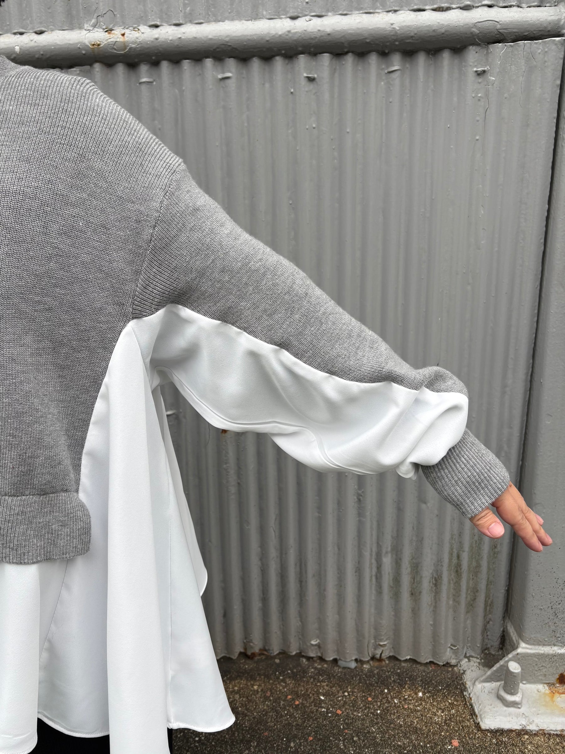 裾フレア異素材ドッキングニット