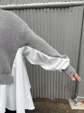 裾フレア異素材ドッキングニット