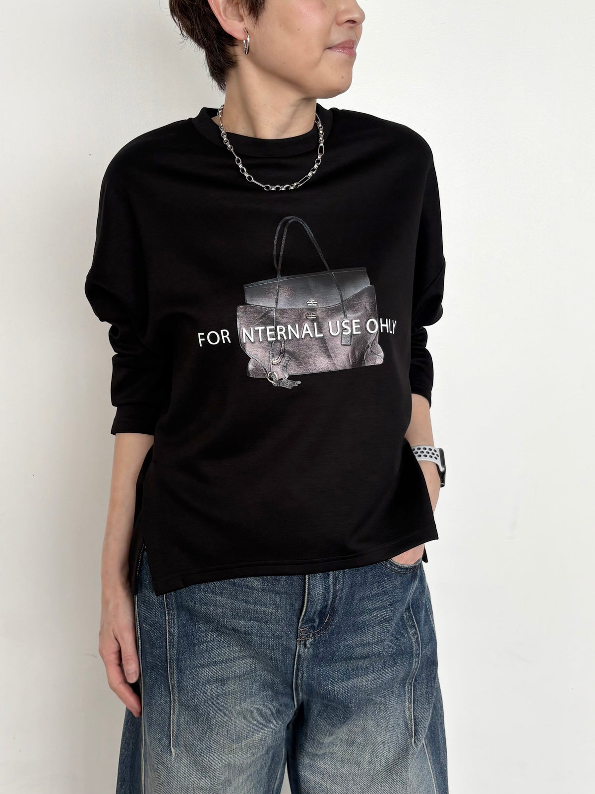 バッグロゴ長袖トップス