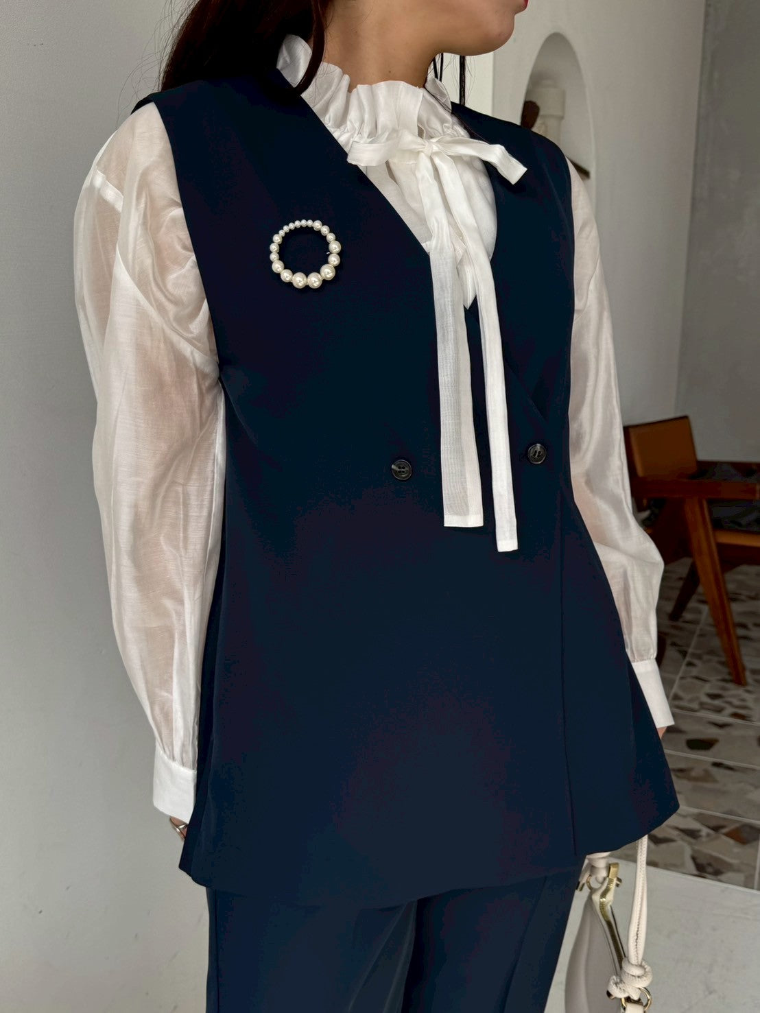 後ろぺプラムベスト